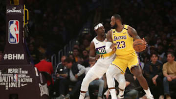 LOS ANGELES, CALIFORNIA - FEBRUARY 25: LeBron James #23 of the Los Angeles Lakers, Jrue Holiday #11 of the New Orleans Pelicans: (Photo by Katelyn Mulcahy/Getty Images)
