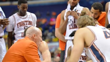 Dec 21, 2016; St. Louis, MO, USA; Illinois Fighting Illini head coach John Groce huddles with his players during a time out in the first half against the Missouri Tigers at Scottrade Center. Mandatory Credit: Denny Medley-USA TODAY Sports