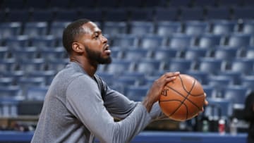MEMPHIS, TN - APRIL 7: JaMychal Green #0 of the Memphis Grizzlies warms up before a game against the New York Knicks on April 7, 2017 at FedExForum in Memphis, Tennessee. NOTE TO USER: User expressly acknowledges and agrees that, by downloading and/or using this photograph, user is consenting to the terms and conditions of the Getty Images License Agreement. Mandatory Copyright Notice: Copyright 2017 NBAE (Photo by Joe Murphy/NBAE via Getty Images)