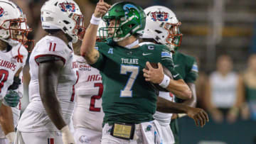 Sep 2, 2023; New Orleans, Louisiana, USA; Tulane Green Wave quarterback Michael Pratt (7) reacts to making a first down against South Alabama Jaguars defensive lineman Jamie Sheriff (11) during the second half at Yulman Stadium. Mandatory Credit: Stephen Lew-USA TODAY Sports