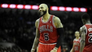 Jan 29, 2014; San Antonio, TX, USA; Chicago Bulls forward Carlos Boozer (5) reacts against the San Antonio Spurs during the second half at the AT&T Center. Chicago beat San Antonio 96-86. Mandatory Credit: Brendan Maloney-USA TODAY Sports