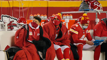 Kansas City Chiefs quarterback Patrick Mahomes (left) and quarterback Matt Moore (middle) and quarterback Chad Henne (4) - Mandatory Credit: Jay Biggerstaff-USA TODAY Sports