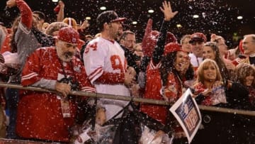 December 23, 2013; San Francisco, CA, USA; San Francisco 49ers fans celebrate after the 49ers made a field goal during the first quarter in the final regular season game against the Atlanta Falcons at Candlestick Park. Mandatory Credit: Kyle Terada-USA TODAY Sports