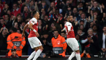 LONDON, ENGLAND - MAY 02: Alexandre Lacazette of Arsenal (9) celebrates as he scores his team's first goal with Pierre-Emerick Aubameyang during the UEFA Europa League Semi Final First Leg match between Arsenal and Valencia at Emirates Stadium on May 02, 2019 in London, England. (Photo by Shaun Botterill/Getty Images)