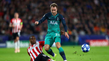 EINDHOVEN, NETHERLANDS - OCTOBER 24: Christian Eriksen of Tottenham Hotspur is tackled by Pablo Rosario of PSV Eindhoven during the Group B match of the UEFA Champions League between PSV and Tottenham Hotspur at Philips Stadion on October 24, 2018 in Eindhoven, Netherlands. (Photo by Dean Mouhtaropoulos/Getty Images)