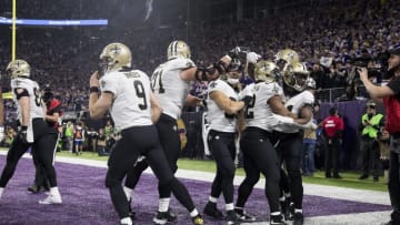 MINNEAPOLIS, MN - JANUARY 14: Members of the New Orleans Saints celebrate a game-tying touchdown from quarterback Drew Brees