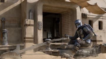 The Mandalorian (Pedro Pascal) and the Child in THE MANDALORIAN, season two, exclusively on Disney+. Image courtesy Disney+