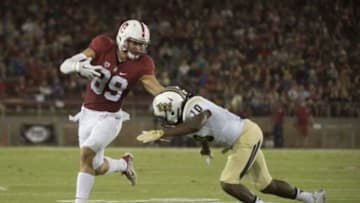 September 12, 2015; Stanford, CA, USA; Stanford Cardinal wide receiver Devon Cajuste (89) runs against Central Florida Knights defensive back Shaquill Griffin (10) during the first quarter at Stanford Stadium. Mandatory Credit: Kyle Terada-USA TODAY Sports