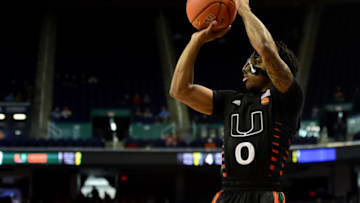 GREENSBORO, NORTH CAROLINA - MARCH 11: Chris Lykes #0 of the Miami Hurricanes attempts a shot against the Clemson Tigersduring their game in the second round of the 2020 Men's ACC Basketball Tournament at Greensboro Coliseum on March 11, 2020 in Greensboro, North Carolina. (Photo by Jared C. Tilton/Getty Images)
