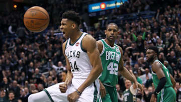 MILWAUKEE, WI - APRIL 20: Milwaukee Bucks' Giannis Antetokounmpo howls after he slammed home the first two points of the game while the Celtics' Al Horford and Jaylen Brown look on. The Boston Celtics visit the Milwaukee Bucks for Game Three of the Eastern Conference First Round during the 2018 NBA Playoffs at the BMO Harris Bradley Center in Milwaukee, WI on April 20, 2018. (Photo by Jim Davis/The Boston Globe via Getty Images)