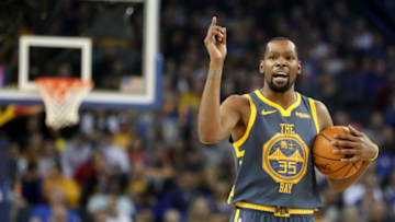 OAKLAND, CALIFORNIA - DECEMBER 12: Golden State Warriors' Kevin Durant (35) looks to pass against the Toronto Raptors during the first quarter of a NBA game at Oracle Arena in Oakland, Calif., on Wednesday, Dec. 12, 2017. (Ray Chavez/Digital First Media/The Mercury News via Getty Images)