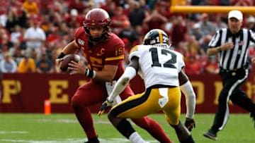 AMES, IA - SEPTEMBER 14: Quarterback Brock Purdy #15 of the Iowa State Cyclones scrambles for yards as defensive back D.J. Johnson #12 of the Iowa Hawkeyes blocks in the first half of play at Jack Trice Stadium on September 14, 2019 in Ames, Iowa. (Photo by David Purdy/Getty Images)