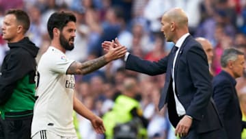 MADRID, SPAIN - MARCH 16: Isco Alarcon of Real Madrid greets Zinedine Zidane, Manager of Real Madrid during the La Liga match between Real Madrid CF and RC Celta de Vigo at Estadio Santiago Bernabeu on March 16, 2019 in Madrid, Spain. (Photo by Quality Sport Images/Getty Images)