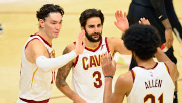 Nov 3, 2021; Cleveland, Ohio, USA; Cleveland Cavaliers forward Cedi Osman (16) and guard Ricky Rubio (3) and center Jarrett Allen (31) celebrate a win over the Portland Trail Blazers at Rocket Mortgage FieldHouse. Mandatory Credit: David Richard-USA TODAY Sports