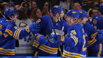 Oct 31, 2022; Buffalo, New York, USA; Buffalo Sabres defenseman Rasmus Dahlin (26) celebrates his goal with teammates during the third period against the Detroit Red Wings at KeyBank Center. Mandatory Credit: Timothy T. Ludwig-USA TODAY Sports