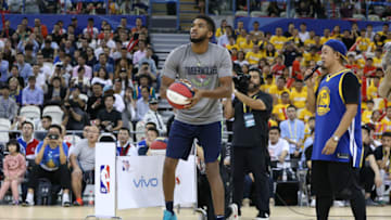 SHANGHAI, CHINA - OCTOBER 07: Karl-Anthony Towns #32 of the Minnesota Timberwolves shoots the ball during fan day as part of 2017 NBA Global Games China on October 7, 2017 at the Oriental Sports Center in Shanghai, China. NOTE TO USER: User expressly acknowledges and agrees that, by downloading and/or using this Photograph, user is consenting to the terms and conditions of the Getty Images License Agreement. Mandatory Copyright Notice: Copyright 2017 NBAE (Photo by David Sherman/NBAE via Getty Images)