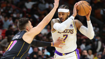Carmelo Anthony #7 of the Los Angeles Lakers is defended by Max Strus #31 of the Miami Heat (Photo by Michael Reaves/Getty Images)