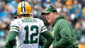 CHARLOTTE, NC - DECEMBER 17: Head coach Mike McCarthy talks to Aaron Rodgers #12 of the Green Bay Packers in the second quarter against the Carolina Panthers at Bank of America Stadium on December 17, 2017 in Charlotte, North Carolina. (Photo by Grant Halverson/Getty Images)