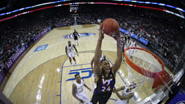 CHARLOTTE, NORTH CAROLINA - MARCH 14: Kerry Blackshear Jr. #24 of the Virginia Tech Hokies dunks the ball against the Florida State Seminoles during their game in the quarterfinal round of the 2019 Men's ACC Basketball Tournament at Spectrum Center on March 14, 2019 in Charlotte, North Carolina. (Photo by Streeter Lecka/Getty Images)