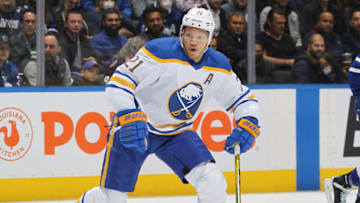 TORONTO, ON - APRIL 12: Kyle Okposo #21 of the Buffalo Sabres skates against the Toronto Maple Leafs during an NHL game at Scotiabank Arena on April 12, 2022 in Toronto, Ontario, Canada. The Sabres defeated the Maple Leafs 5-2. (Photo by Claus Andersen/Getty Images)