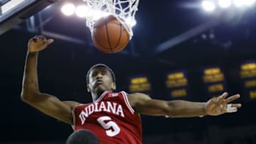 Mar 8, 2014; Ann Arbor, MI, USA; Indiana Hoosiers forward Troy Williams (5) dunks in the second half against the Michigan Wolverines at Crisler Arena. Michigan won 84-80. Mandatory Credit: Rick Osentoski-USA TODAY Sports