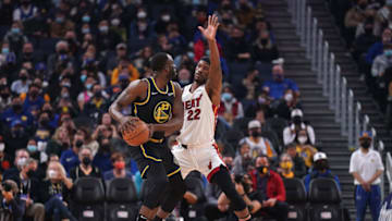 Miami Heat forward Jimmy Butler (22) defends Golden State Warriors forward Draymond Green (23)(Cary Edmondson-USA TODAY Sports)
