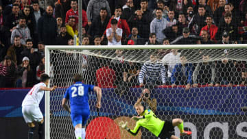 SEVILLE, SPAIN - FEBRUARY 22: Kasper Schmeichel of Leicester City saves a penalty from Joaquin Correa of Sevilla during the UEFA Champions League Round of 16 first leg match between Sevilla FC and Leicester City at Estadio Ramon Sanchez Pizjuan on February 22, 2017 in Seville, Spain. (Photo by Michael Regan/Getty Images)