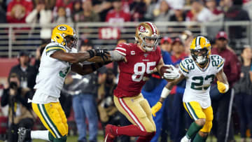SANTA CLARA, CALIFORNIA - NOVEMBER 24: Tight end George Kittle #85 of the San Francisco 49ers carries the ball after making a catch as cornerback Jaire Alexander #23 of the Green Bay Packers defends during the first half of the game at Levi's Stadium on November 24, 2019 in Santa Clara, California. (Photo by Thearon W. Henderson/Getty Images)