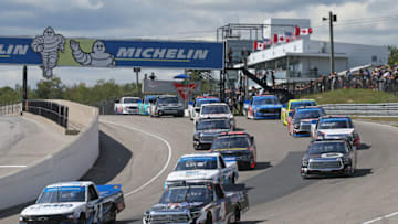 BOWMANVILLE, ON - AUGUST 25: Brett Moffitt #24 driving the CMR Construction & Roofing Chevrolet leads the field away from pole position in the Chevrolet Silverado 250 Gander Nascar Outdoor Truck Series event at Canadian Tire Motorsport Park on August 25, 2019 in Bowmanville, Ontario, Canada. (Photo by Claus Andersen/Getty Images)