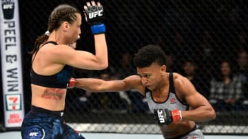 NORFOLK, VA - NOVEMBER 11: (R-L) Angela Hill punches Nina Ansaroff in their women's strawweight bout during the UFC Fight Night event inside the Ted Constant Convention Center on November 11, 2017 in Norfolk, Virginia. (Photo by Brandon Magnus/Zuffa LLC/Zuffa LLC via Getty Images)