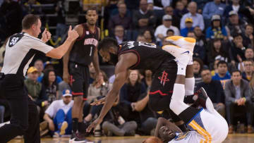 December 1, 2016; Oakland, CA, USA; Houston Rockets guard James Harden (13) and Golden State Warriors forward Draymond Green (23) during the second overtime at Oracle Arena. The Rockets defeated the Warriors 132-127 in double overtime. Mandatory Credit: Kyle Terada-USA TODAY Sports