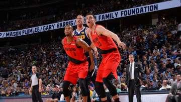 DENVER, CO - MAY 12: Rodney Hood #5 and Zach Collins #33 of the Portland Trail Blazers box out Mason Plumlee #24 of the Denver Nuggets to grab the rebound during Game Seven of the Western Conference Semifinals of the 2019 NBA Playoffs on May 12, 2019 at the Pepsi Center in Denver, Colorado. NOTE TO USER: User expressly acknowledges and agrees that, by downloading and/or using this Photograph, user is consenting to the terms and conditions of the Getty Images License Agreement. Mandatory Copyright Notice: Copyright 2019 NBAE (Photo by Bart Young/NBAE via Getty Images)