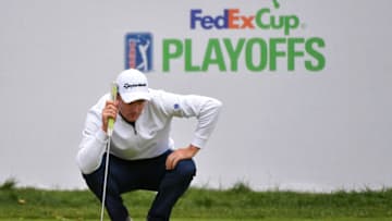 NEWTOWN SQUARE, PA - SEPTEMBER 10: Justin Rose of England lines up a putt on the 18th green during the weather delayed final round of the BMW Championship at Aronimink Golf Club on September 10, 2018 in Newtown Square, Pennsylvania. (Photo by Drew Hallowell/Getty Images)