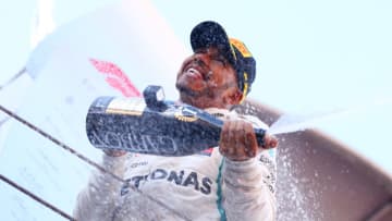 MONTMELO, SPAIN - MAY 13: Race winner Lewis Hamilton of Great Britain and Mercedes GP celebrates on the podium during the Spanish Formula One Grand Prix at Circuit de Catalunya on May 13, 2018 in Montmelo, Spain. (Photo by Dan Istitene/Getty Images)