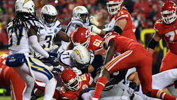 KANSAS CITY, MISSOURI - DECEMBER 13: Running back Damien Williams #26 of the Kansas City Chiefs crosses the goal line to score a touchdown during the game against the Los Angeles Chargers at Arrowhead Stadium on December 13, 2018 in Kansas City, Missouri. (Photo by Peter Aiken/Getty Images)