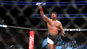 LAS VEGAS, NV - MARCH 04: Alistair Overeem (C) of the Netherlands celebrates after his third-round knockout of Mark Hunt of Australia in a heavyweight bout during UFC 209 at T-Mobile Arena on March 4, 2017 in Las Vegas, Nevada. (Photo by Steve Marcus/Getty Images)