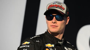 SONOMA, CA - SEPTEMBER 17: Josef Newgarden, driver of the #2 hum by Verizon Chevrolet, stands on the podium after winning the Verizon IndyCar championship following the Verizon IndyCar Series GoPro Grand Prix of Sonoma at Sonoma Raceway on September 17, 2017 in Sonoma, California. (Photo by Robert Reiners/Getty Images)