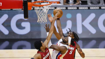 Jerami Grant #9 of the Detroit Pistons goes up for layup against the Miami Heat (Photo by Michael Reaves/Getty Images)