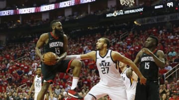 HOUSTON, TX - MAY 02: James Harden #13 of the Houston Rockets goes up for a shot defended by Rudy Gobert #27 of the Utah Jazz in the second half during Game Two of the Western Conference Semifinals of the 2018 NBA Playoffs at Toyota Center on May 2, 2018 in Houston, Texas. NOTE TO USER: User expressly acknowledges and agrees that, by downloading and or using this photograph, User is consenting to the terms and conditions of the Getty Images License Agreement. (Photo by Tim Warner/Getty Images)