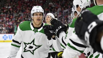 RALEIGH, NORTH CAROLINA - FEBRUARY 25: Denis Gurianov #34 of the Dallas Stars celebrates with teammates after scoring a goal against the Carolina Hurricanes during the second period at PNC Arena on February 25, 2020 in Raleigh, North Carolina. (Photo by Grant Halverson/Getty Images)