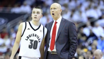 LOUISVILLE, KENTUCKY - FEBRUARY 02: Chris Mack the head coach of the Louisville Cardinals give instructions to Ryan McMahon #30 against the North Carolina Tar Heels at KFC YUM! Center on February 02, 2019 in Louisville, Kentucky. (Photo by Andy Lyons/Getty Images)