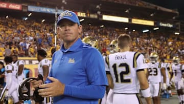 TEMPE, AZ - OCTOBER 08: Head coach Jim Mora of the UCLA Bruins walks the sidelines before the college football game against the Arizona State Sun Devils at Sun Devil Stadium on October 8, 2016 in Tempe, Arizona. (Photo by Christian Petersen/Getty Images)