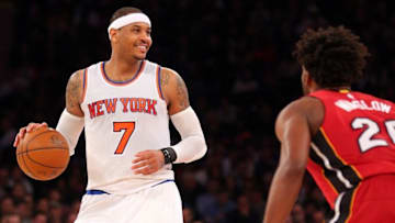 Feb 28, 2016; New York, NY, USA; New York Knicks small forward Carmelo Anthony (7) reacts against Miami Heat small forward Justise Winslow (20) during the third quarter at Madison Square Garden. Mandatory Credit: Brad Penner-USA TODAY Sports