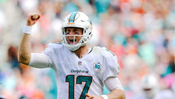 Oct 25, 2015; Miami Gardens, FL, USA; Miami Dolphins quarterback Ryan Tannehill (17) celebrates after running back Lamar Miller (not pictured) scors a touchdown against the Houston Texans during the first half at Sun Life Stadium. Mandatory Credit: Steve Mitchell-USA TODAY Sports