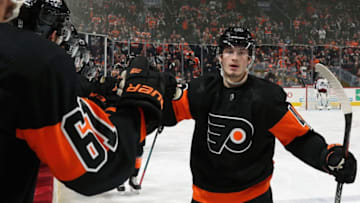 PHILADELPHIA, PA - FEBRUARY 01: Joel Farabee #49 of the Philadelphia Flyers celebrates his second period goal against the Colorado Avalanche with his teammates on the bench on February 1, 2020 at the Wells Fargo Center in Philadelphia, Pennsylvania. (Photo by Len Redkoles/NHLI via Getty Images)