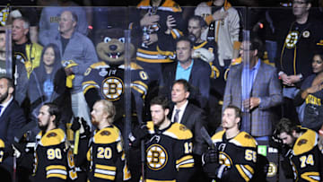 BOSTON, MA - JUNE 6: The Boston Bruins bench and Coach Cassidy stand for the National Anthem. During Game 5 of the Stanley Cup Finals featuring the Boston Bruins against the St. Louis Blues on June 6, 2019 at TD Garden in Boston, MA. (Photo by Michael Tureski/Icon Sportswire via Getty Images)