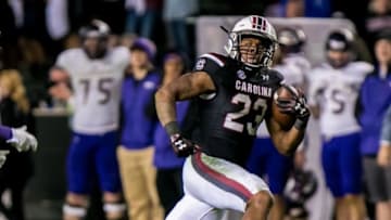 Nov 19, 2016; Columbia, SC, USA; South Carolina Gamecocks running back Rico Dowdle (23) rushes against the Western Carolina Catamounts in the second half at Williams-Brice Stadium. Mandatory Credit: Jeff Blake-USA TODAY Sports
