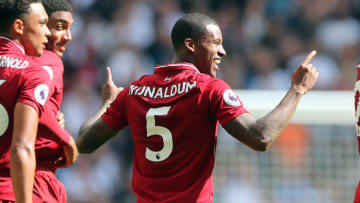 LONDON, ENGLAND - SEPTEMBER 15: Georginio Wijnaldum of Liverpool celebrates scoring their 1st goal during the Premier League match between Tottenham Hotspur and Liverpool FC at Wembley Stadium on September 15, 2018 in London, United Kingdom. (Photo by Charlotte Wilson/Offside/Getty Images)