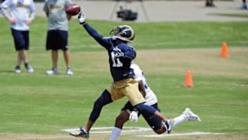 Jun 17, 2014; St. Louis, MO, USA; St. Louis Rams wide receiver Tavon Austin (11) is unable to catch a ball during minicamp at Rams Park. Mandatory Credit: Jeff Curry-USA TODAY Sports