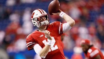 INDIANAPOLIS, IN - DECEMBER 02: Quarterback Alex Hornibrook #12 of the Wisconsin Badgers throws a pass while warming up before playing against the Ohio State Buckeyes at Lucas Oil Stadium on December 2, 2017 in Indianapolis, Indiana. (Photo by Andy Lyons/Getty Images)